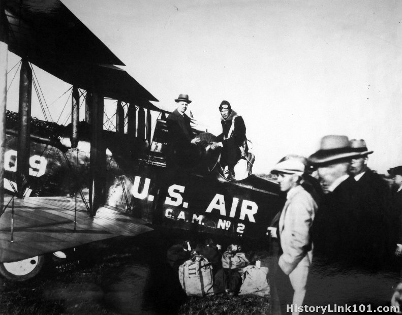First sack. Lindbergh and Green loading cargo