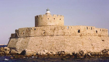 statues near harbor island of rhodes